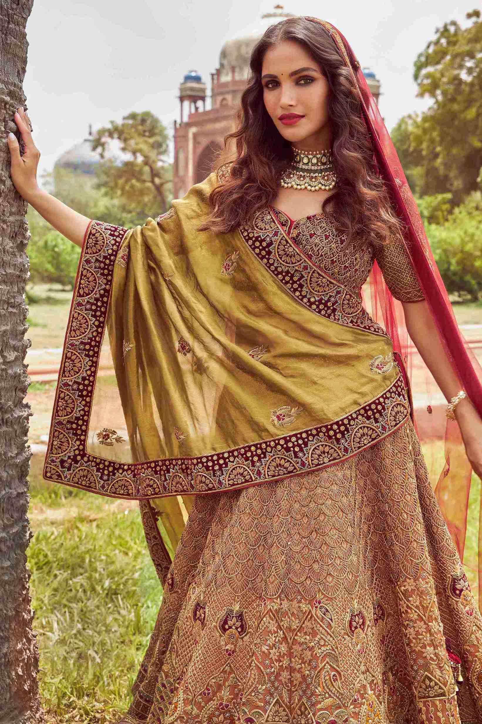 Rust gold raw silk Lehenga Choli embellished with Zardozi and Sequins work - House of Surya