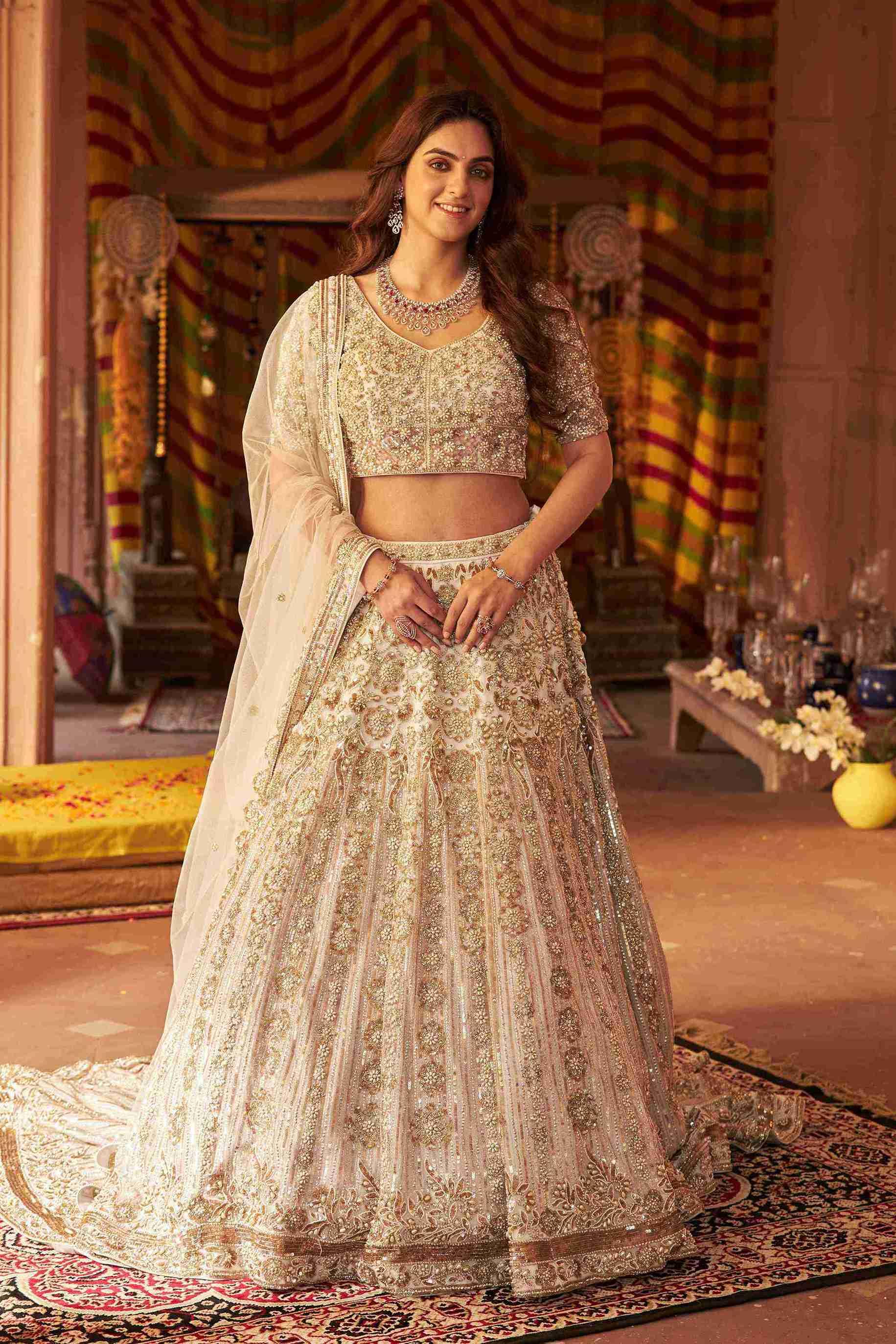 Ivory Lehenga Choli with Pearls, Sequins and Cut Dana Work - House of Surya