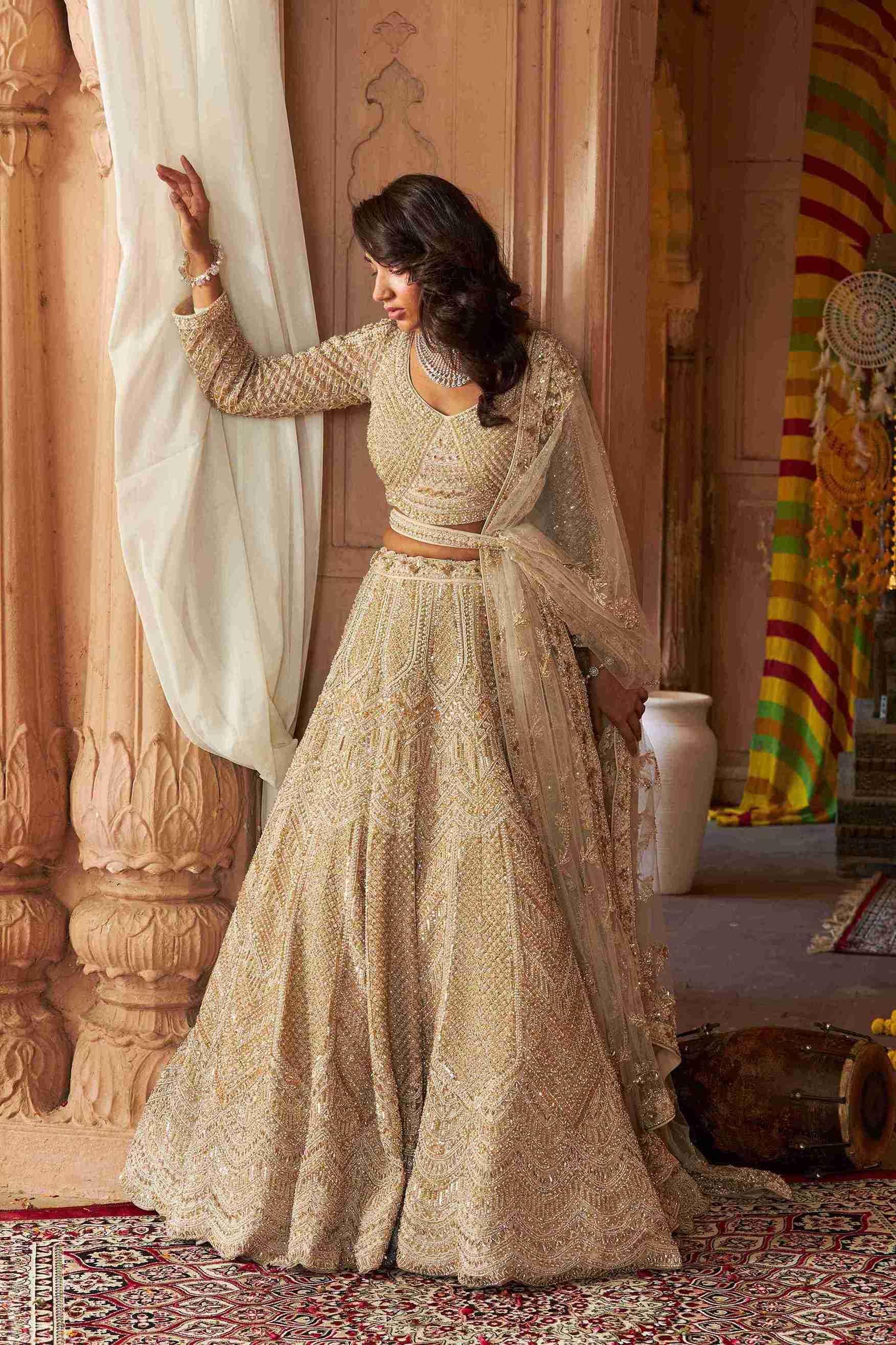 Ivory Bridal Lehenga Choli with Pearls, Sequins and Cutdana work - House of Surya