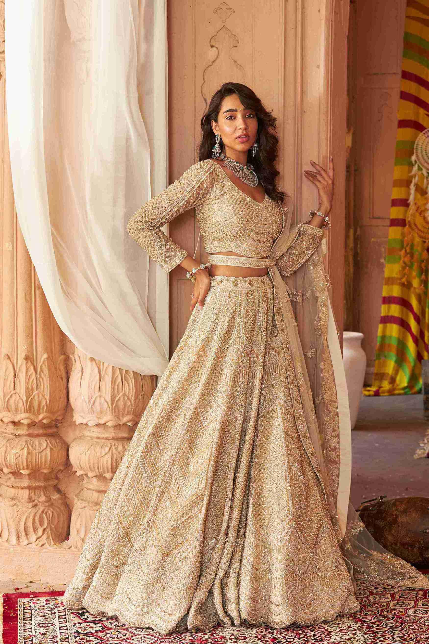Ivory Bridal Lehenga Choli with Pearls, Sequins and Cutdana work - House of Surya