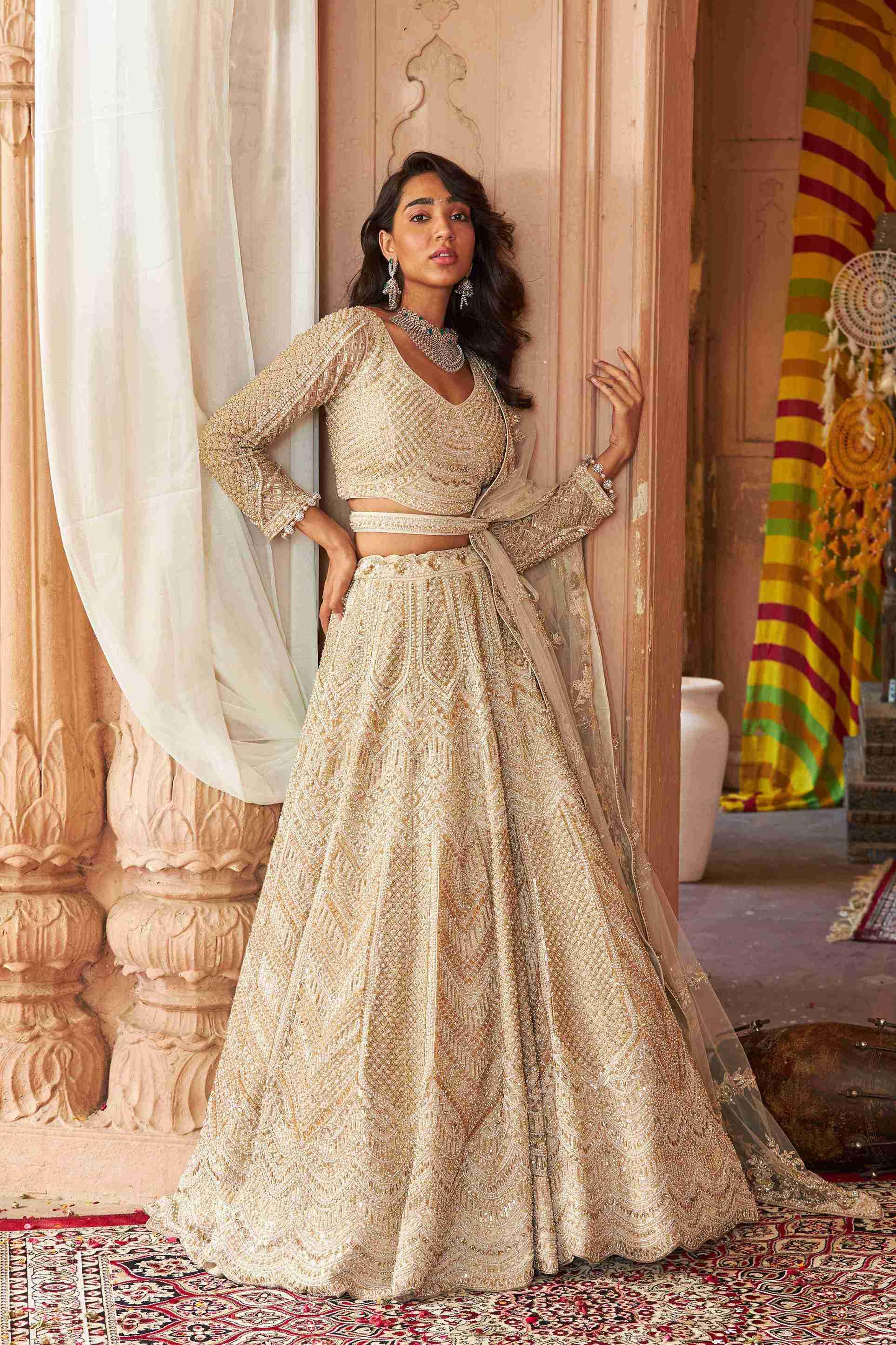 Ivory Bridal Lehenga Choli with Pearls, Sequins and Cutdana work - House of Surya