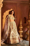 Ivory Lehenga Choli with Zardozi, Sequins, and Cutdana Work - House of Surya