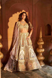 Ivory Lehenga Choli with Zardozi, Sequins, and Cutdana Work - House of Surya