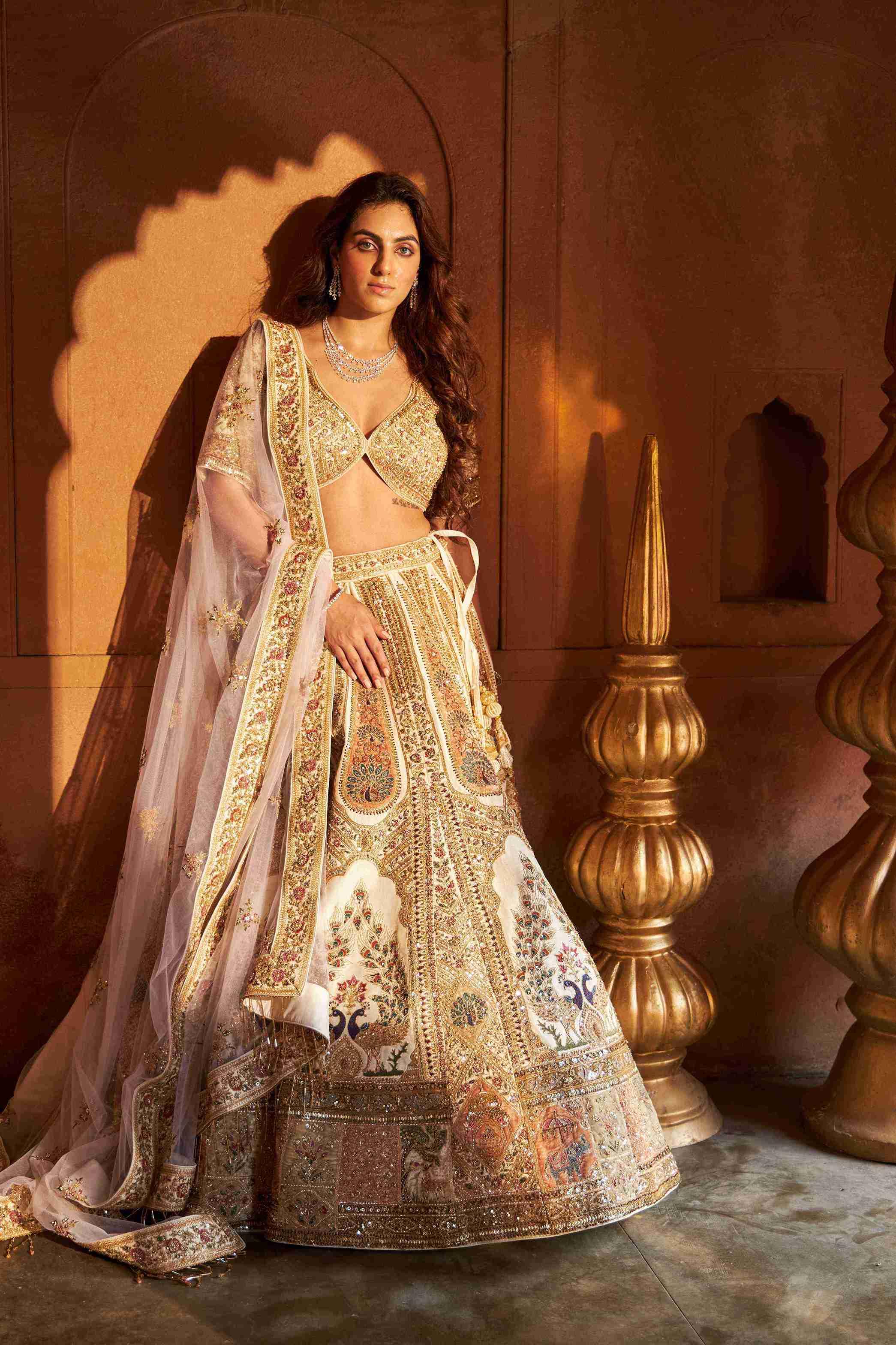Ivory Lehenga Choli with Zardozi, Sequins, and Cutdana Work - House of Surya