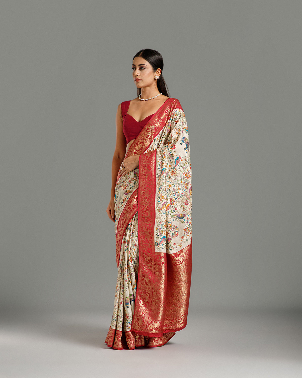 Off White Dola Silk Saree with Zari & Sequin Work