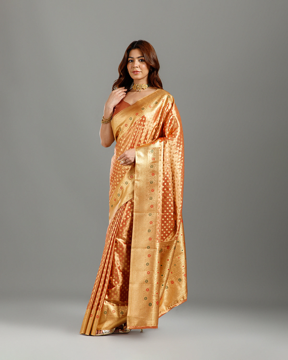 Graceful Rust Tissue Silk Saree with Self Weaving Design