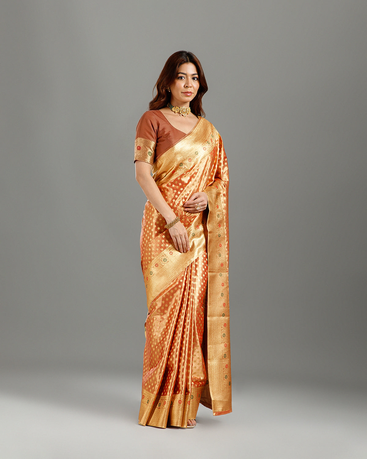 Graceful Rust Tissue Silk Saree with Self Weaving Design