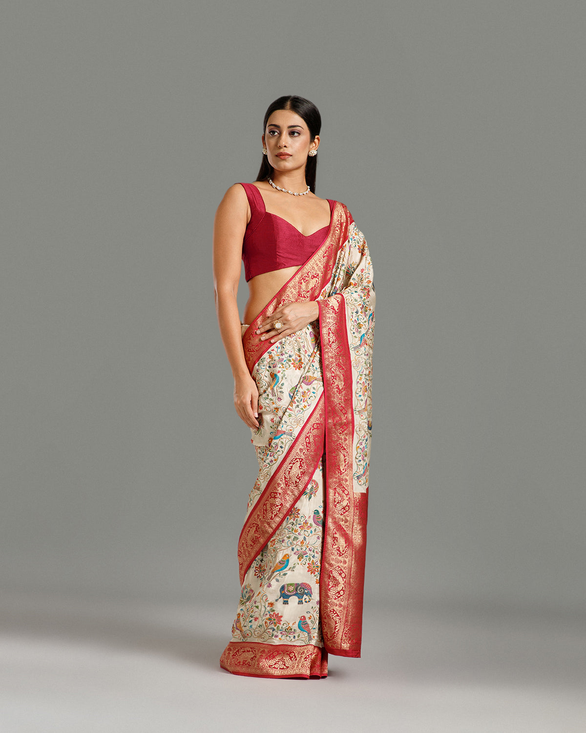 Off White Dola Silk Saree with Zari & Sequin Work