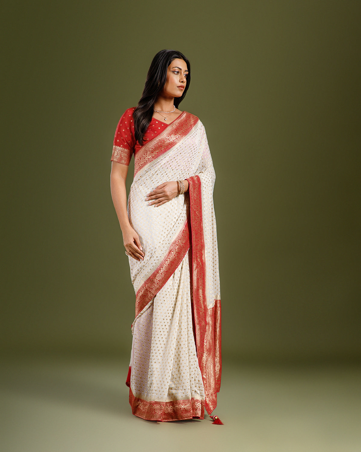 Elegant Ivory Saree in Georgette with Self Weaving Pattern - House of Surya