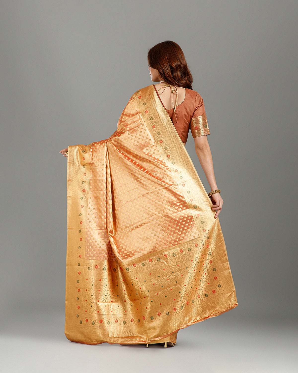 Graceful Rust Tissue Silk Saree with Self Weaving Design