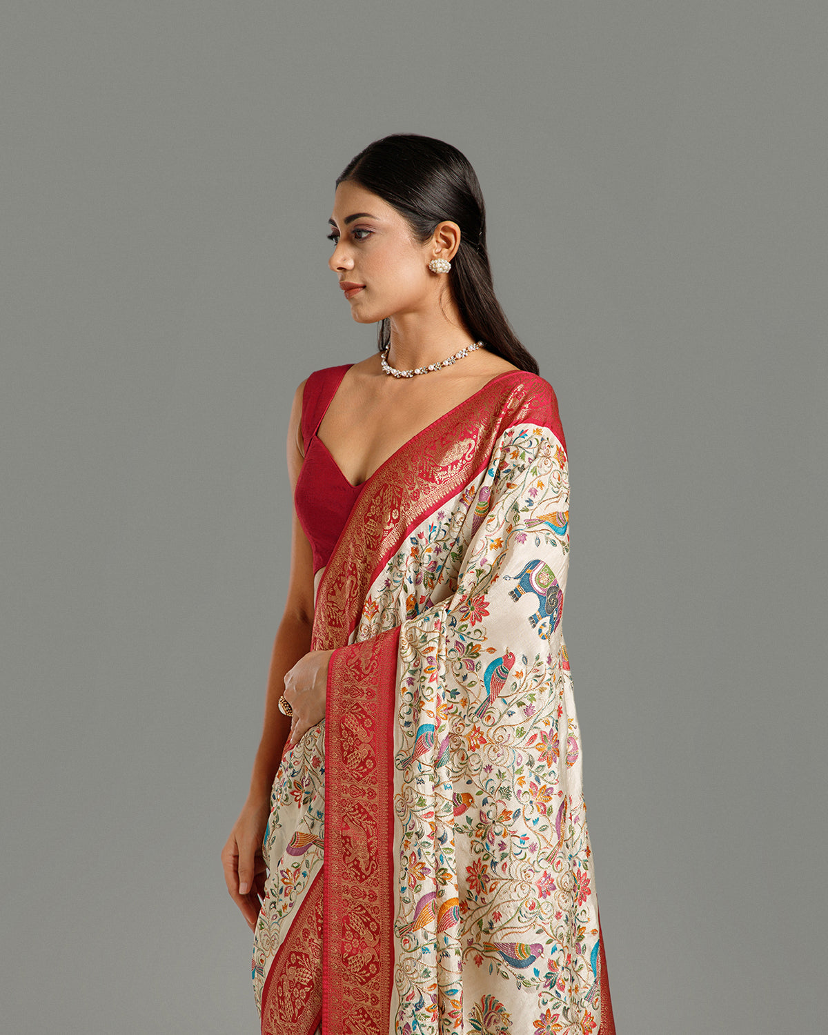 Off White Dola Silk Saree with Zari & Sequin Work