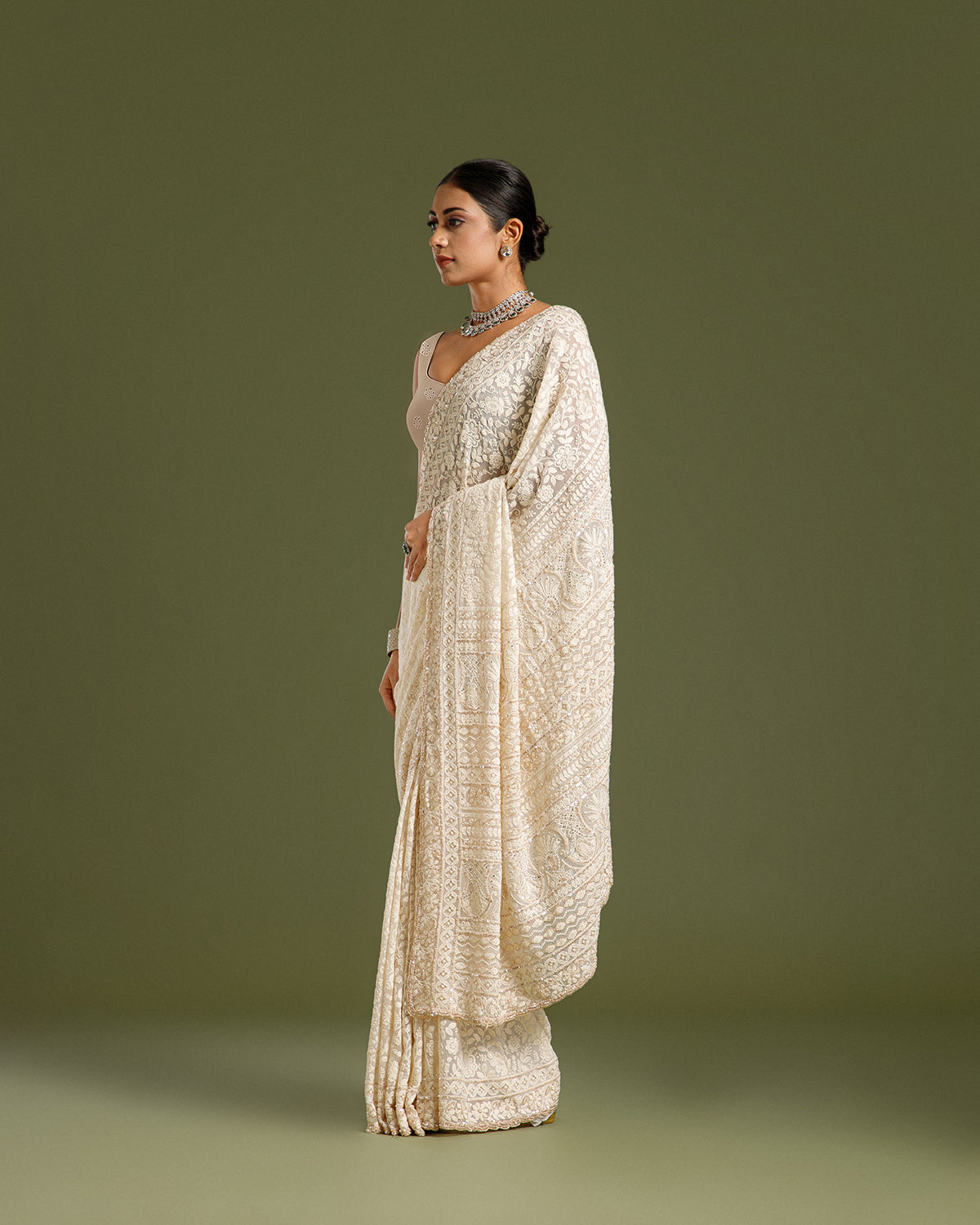 Off White Georgette Saree with Nulki, Sequin & Resham Work