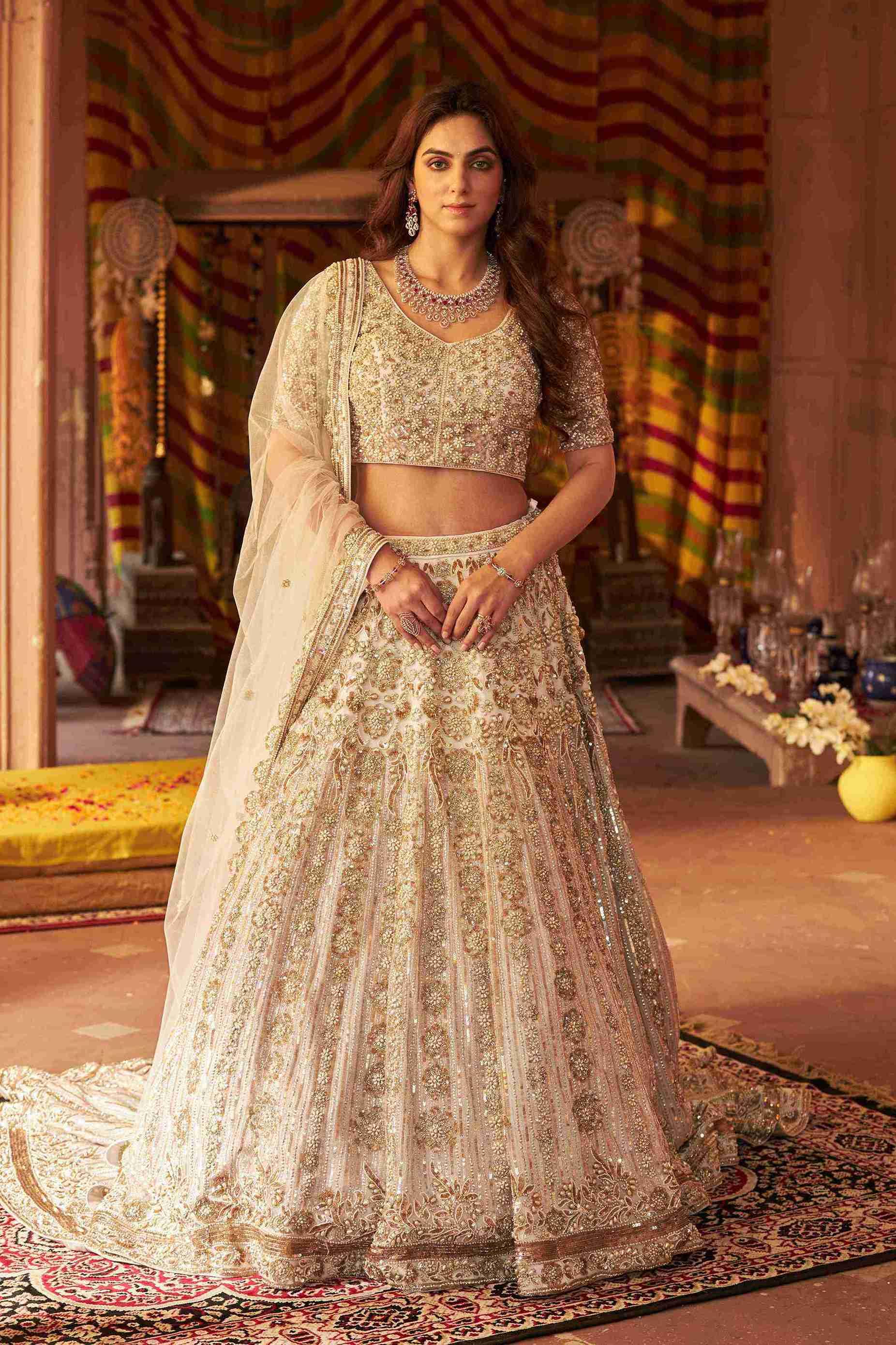 Ivory Lehenga Choli with Pearls, Sequins and Cut Dana Work - House of Surya