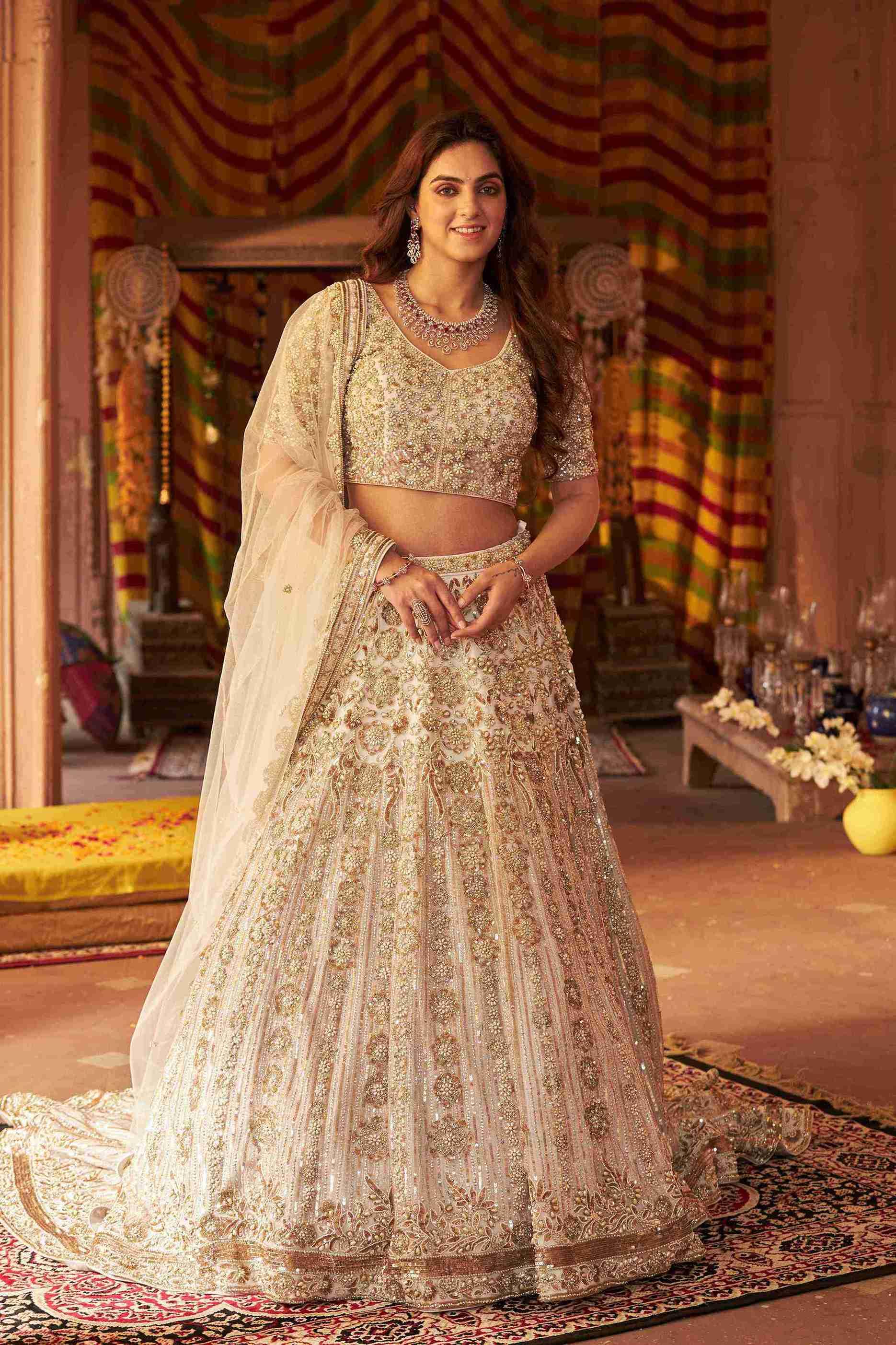 Ivory Lehenga Choli with Pearls, Sequins and Cut Dana Work - House of Surya