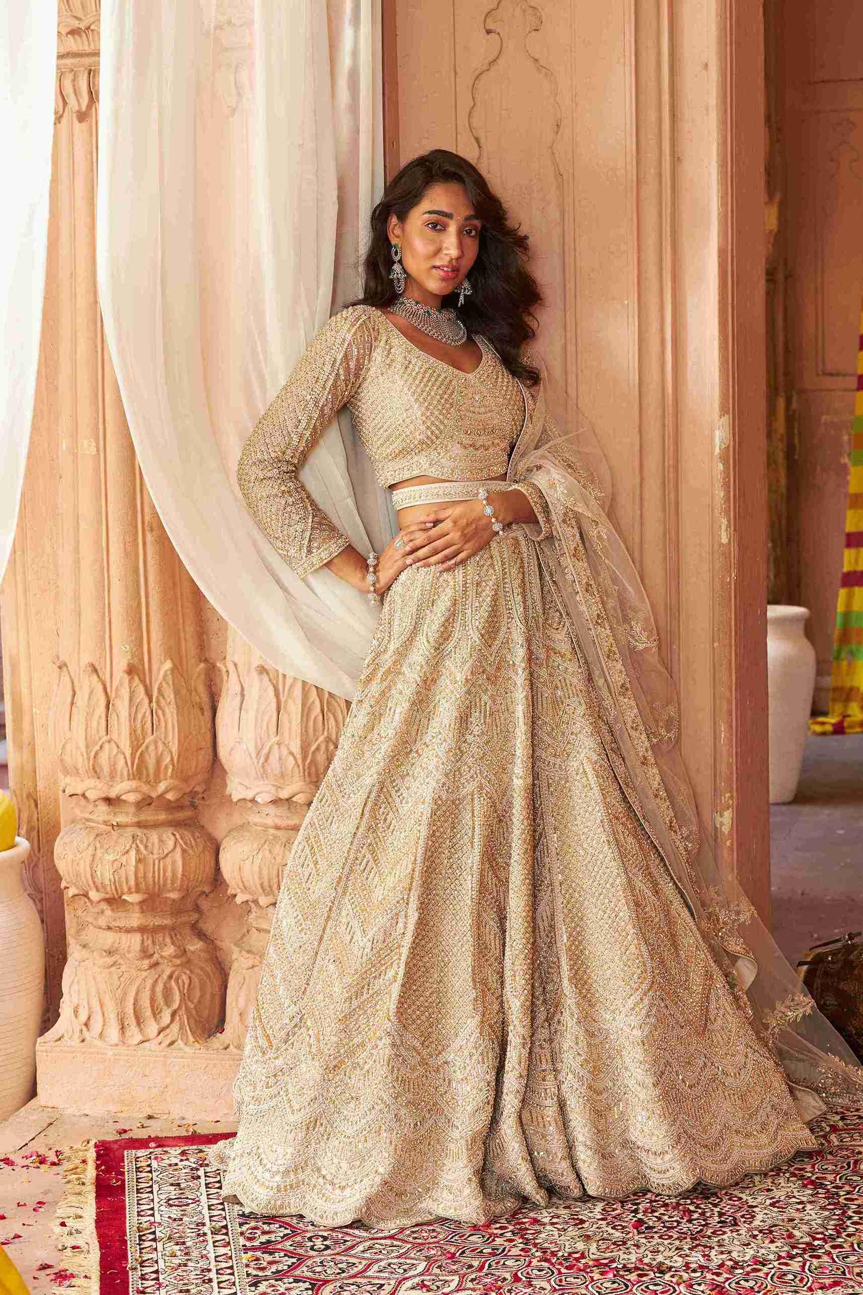 Ivory Bridal Lehenga Choli with Pearls, Sequins and Cutdana work - House of Surya