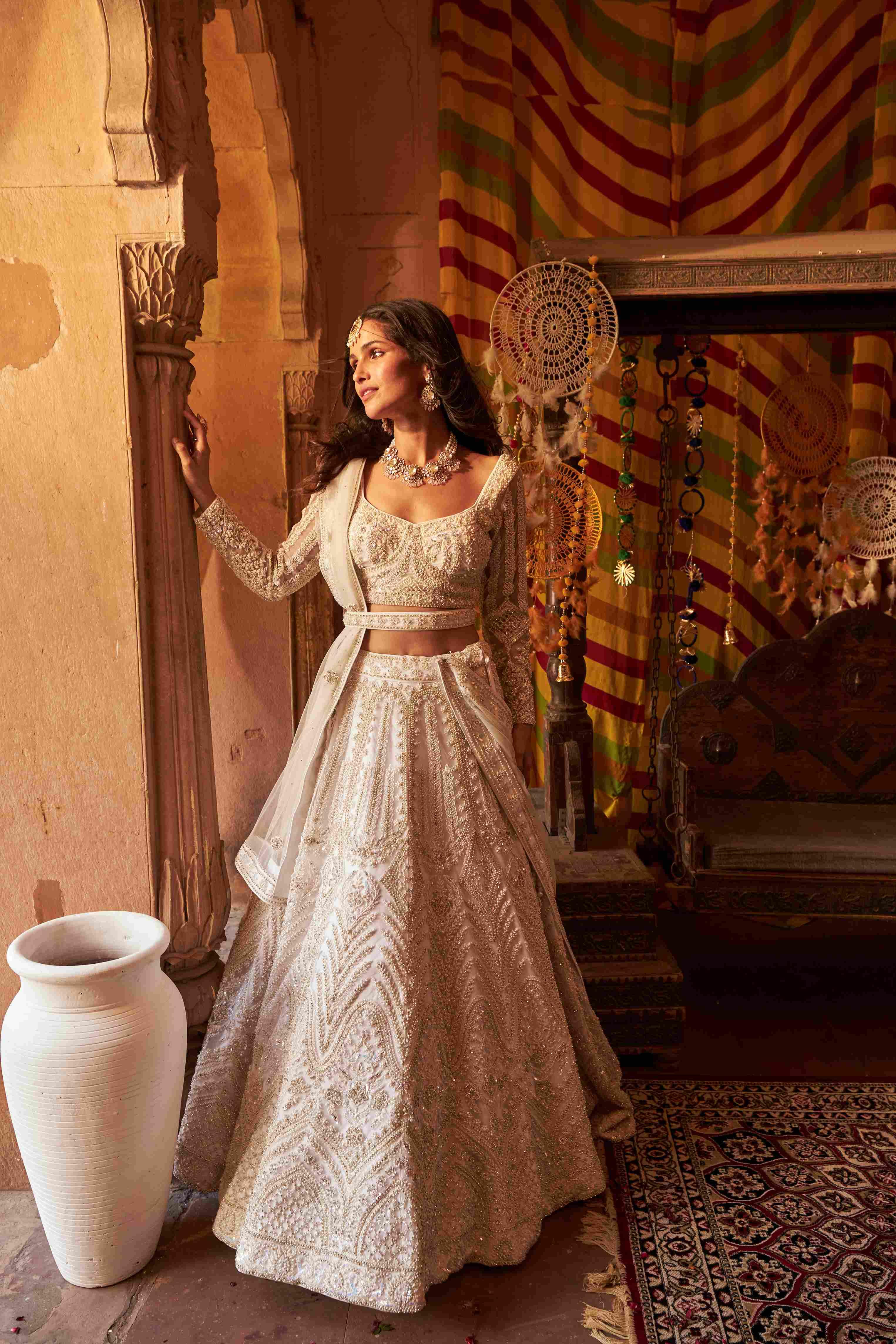 Ivory Net Lehenga with Cutdana, Pearls, Sequins, and Dori Detailing - House of Surya